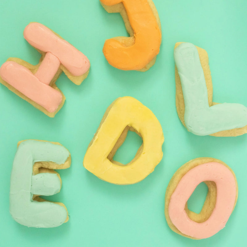 Custom hand-frosted letter sugar cookies